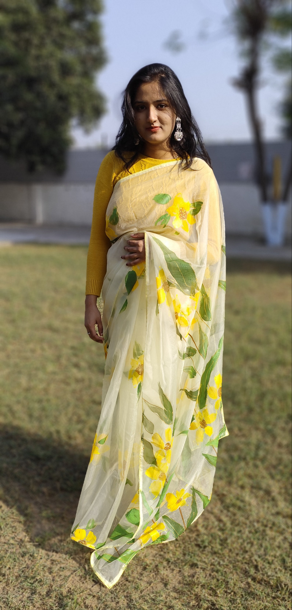 Hand painted white sunflower organza saree