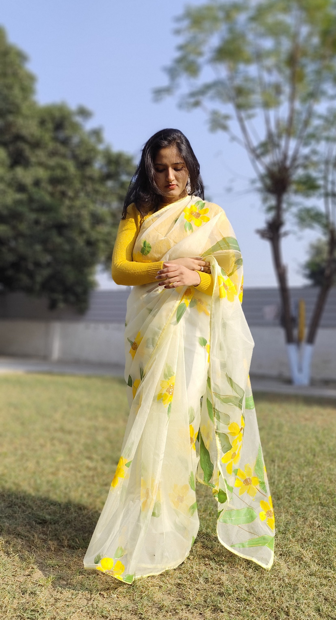 Hand painted white sunflower organza saree