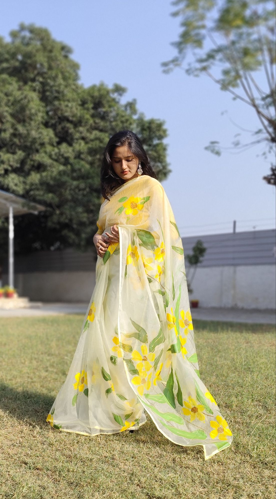 Hand painted white sunflower organza saree