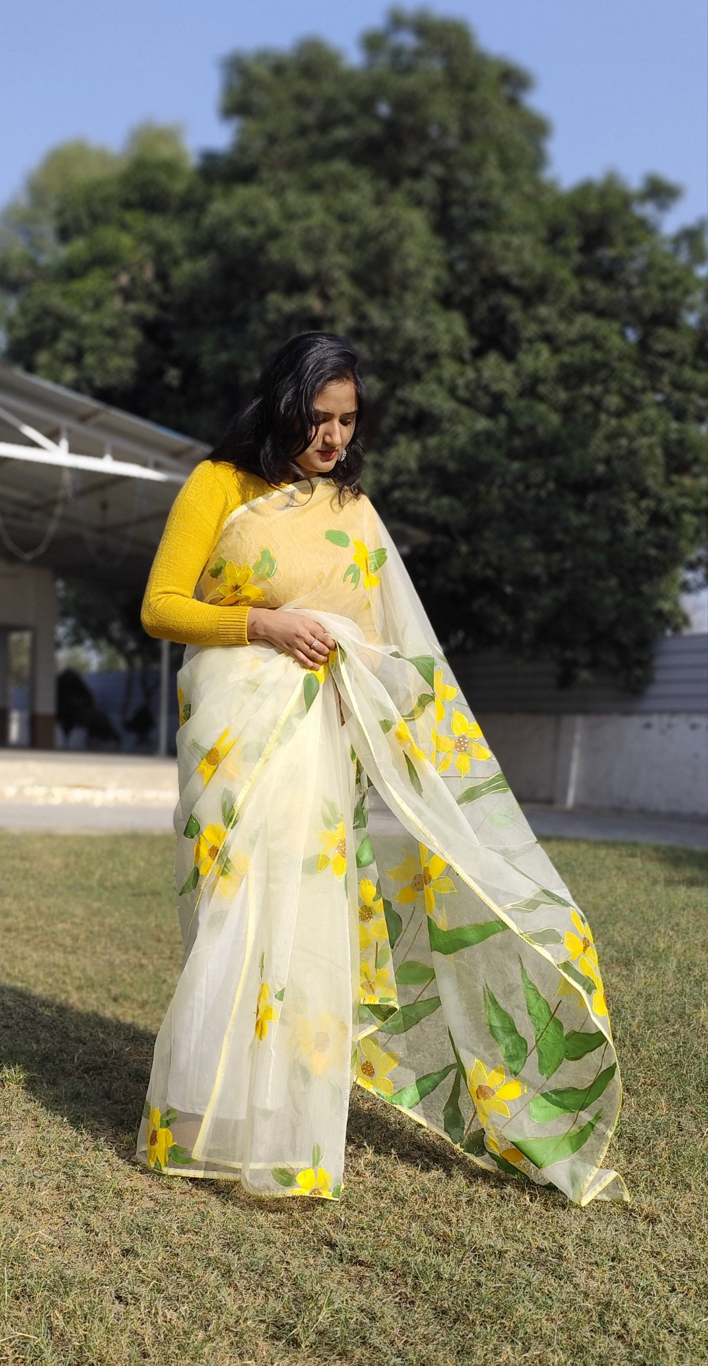 Hand painted white sunflower organza saree