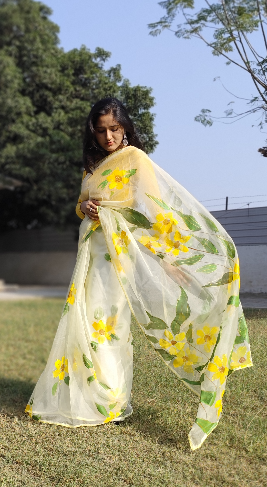 Hand painted white sunflower organza saree