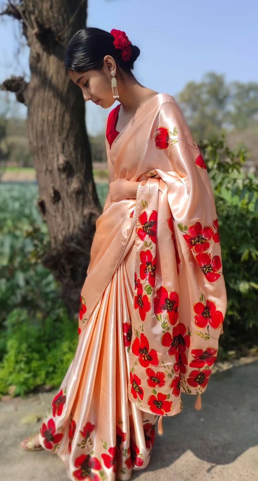 Peach Hand-painted silk saree with  poppies flowers