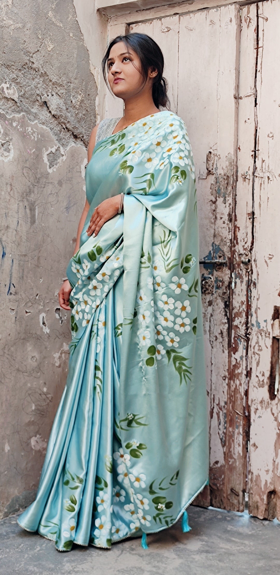 Hand-painted sapphire blue silk saree.