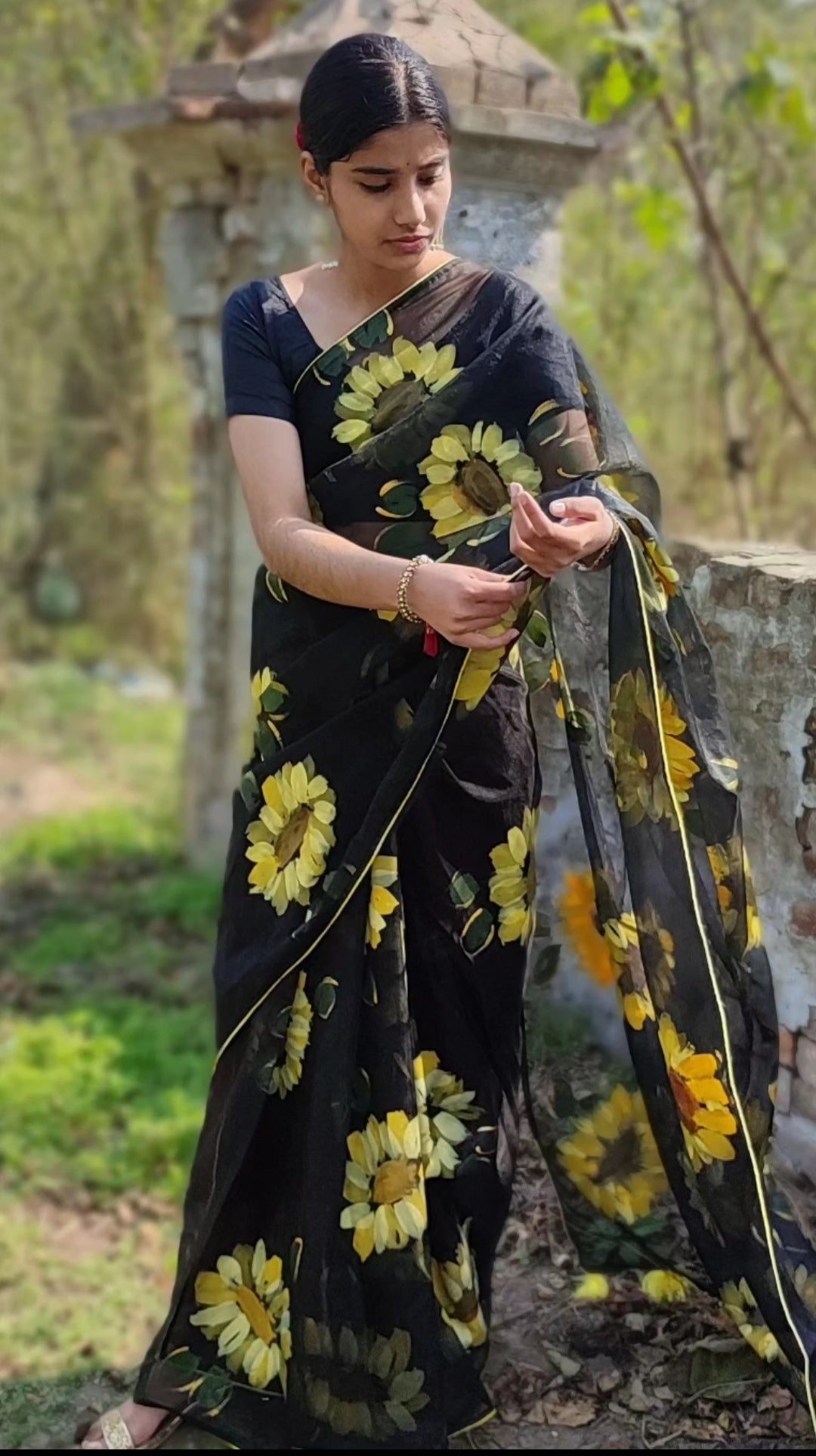 Black Hand-painted organza saree with tassels