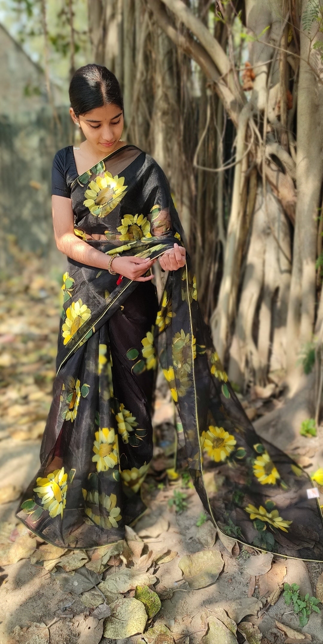 Black Hand-painted organza saree with tassels