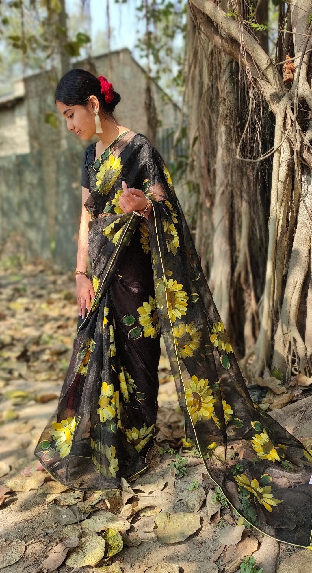 Black Hand-painted organza saree with tassels