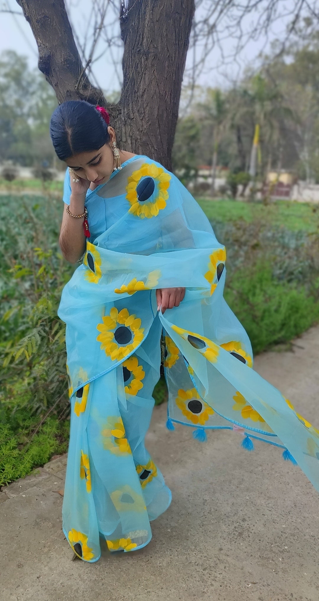 Sky blue Hand-painted  organza saree with tassels