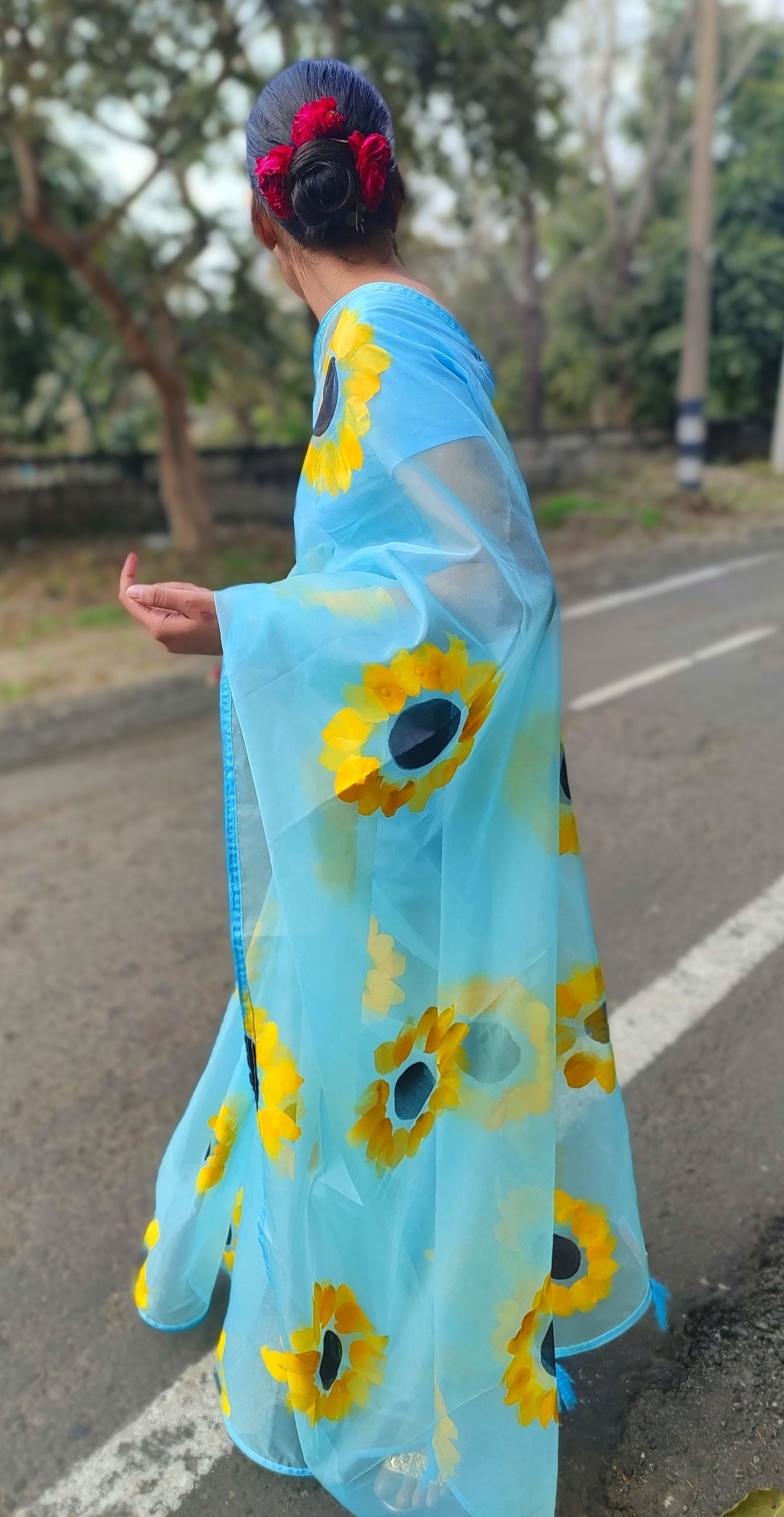 Sky blue Hand-painted  organza saree with tassels