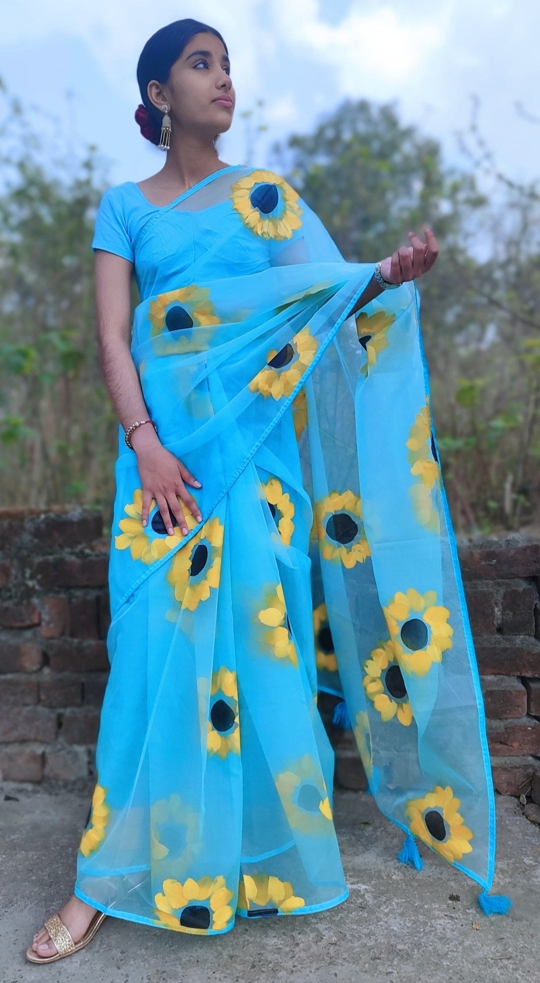 Sky blue Hand-painted  organza saree with tassels