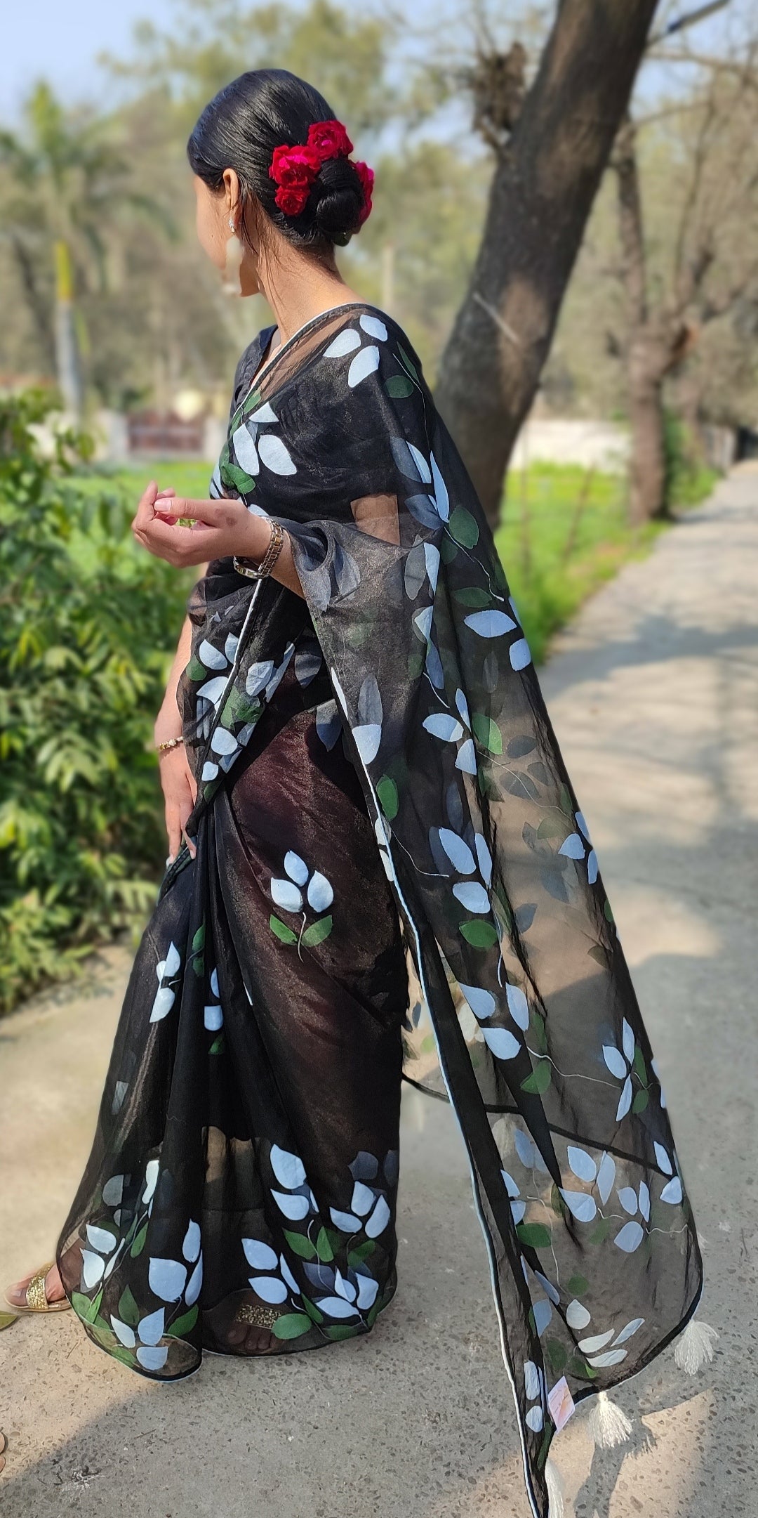 Hand-painted bougainvillea organza saree with white tassel