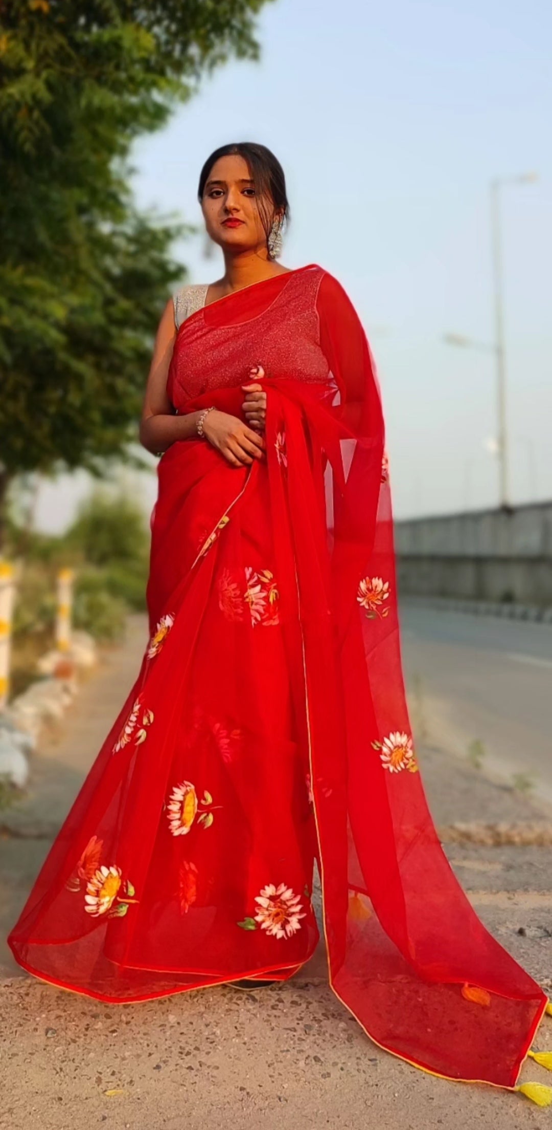 Red Hand-painted organza saree with tassels