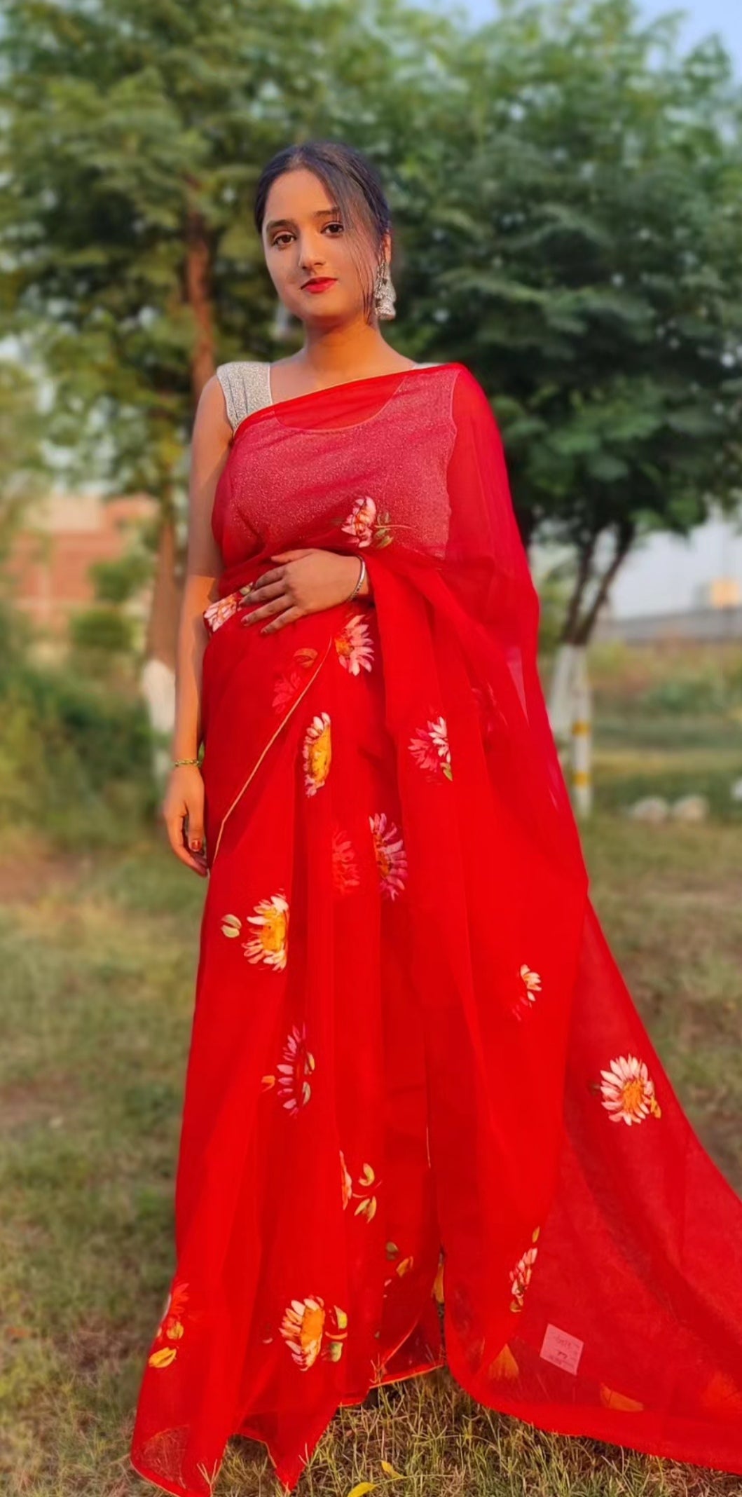 Red Hand-painted organza saree with tassels