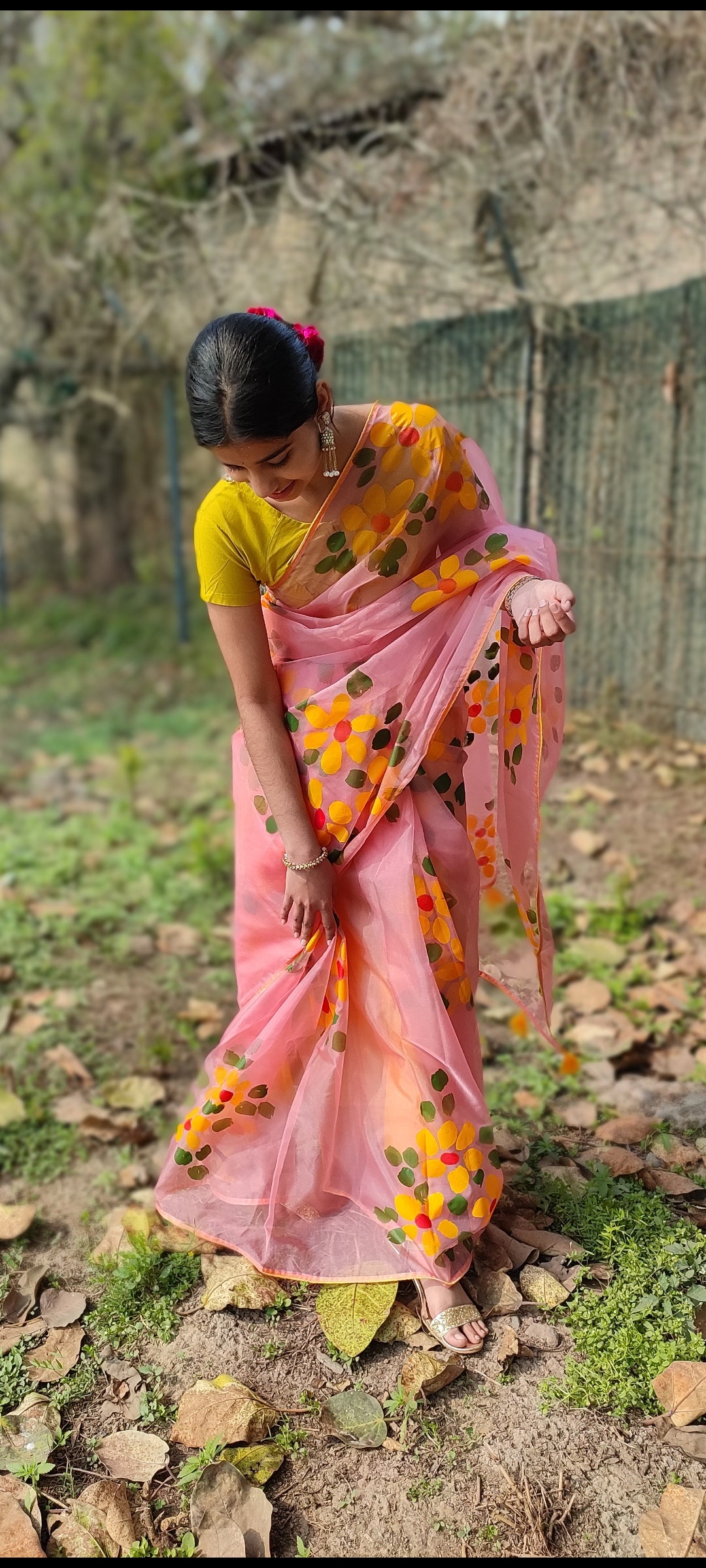 Peach Hand-painted organza saree with beautiful tassels