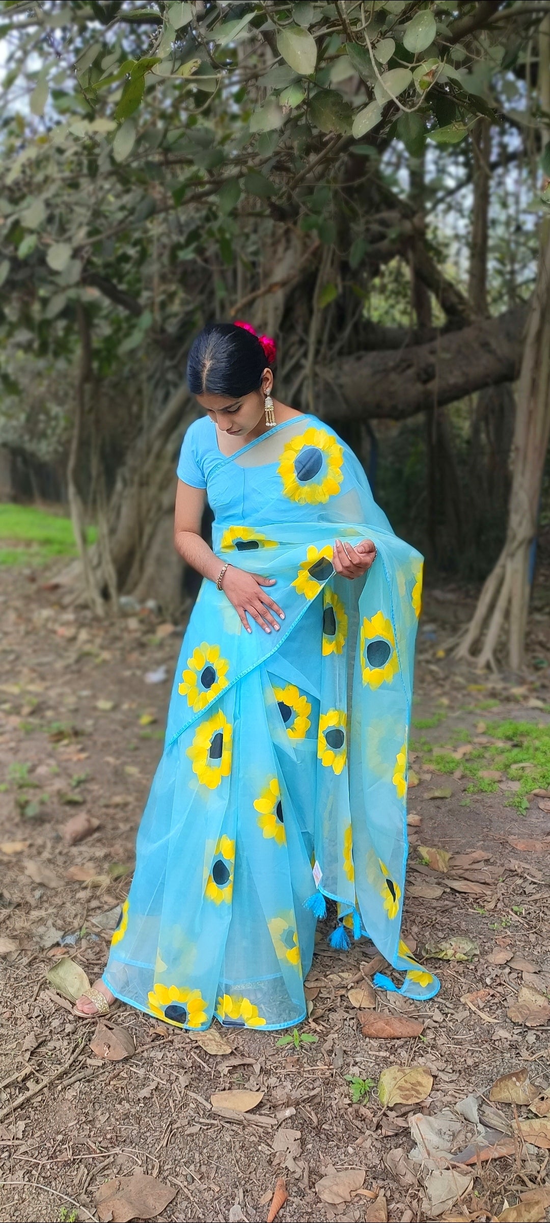 Sky blue Hand-painted  organza saree with tassels
