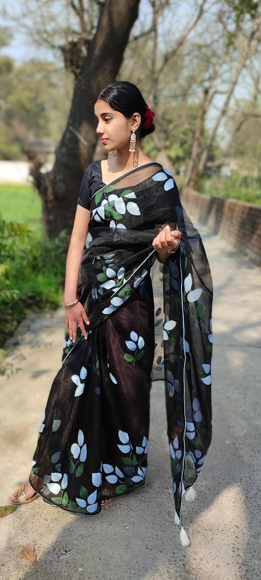 Hand-painted bougainvillea organza saree with white tassel
