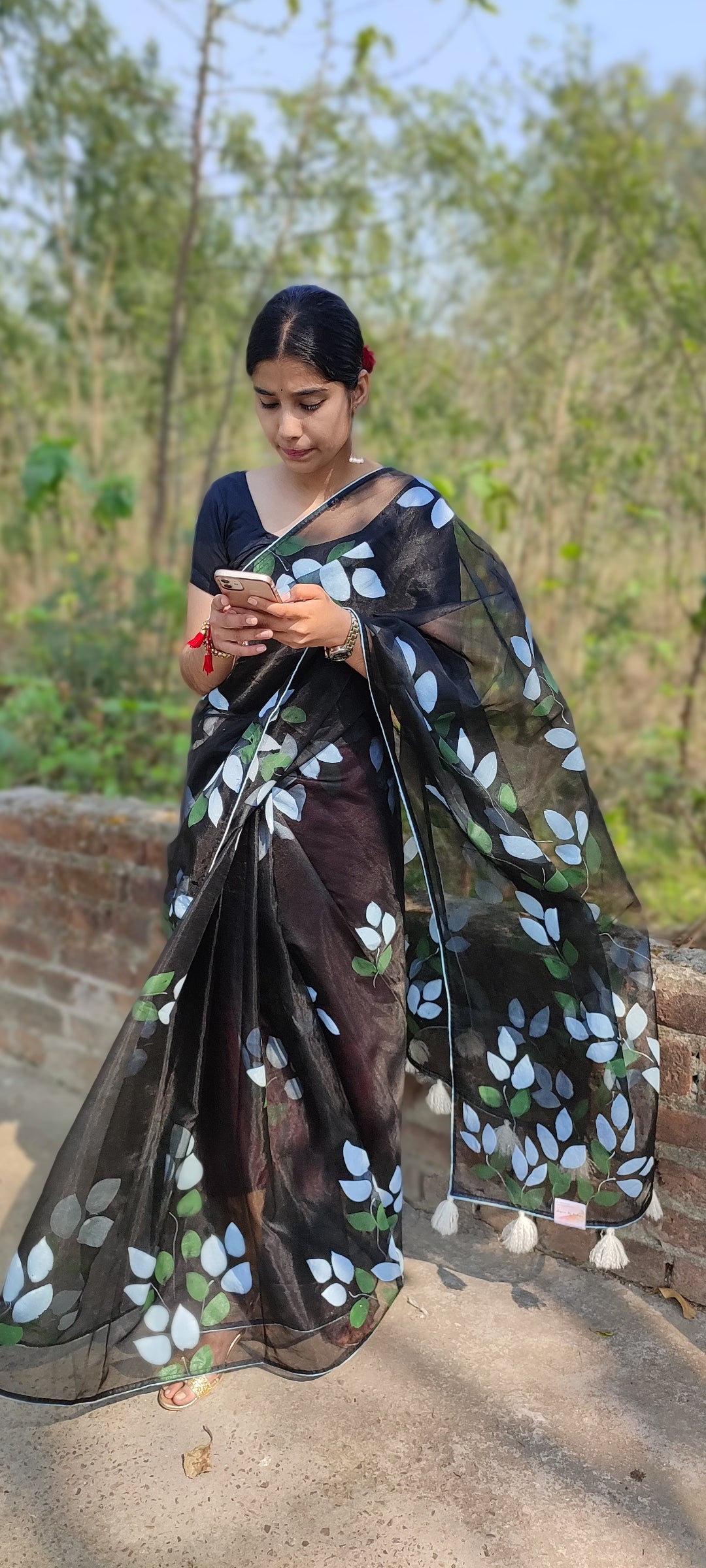 Hand-painted bougainvillea organza saree with white tassel