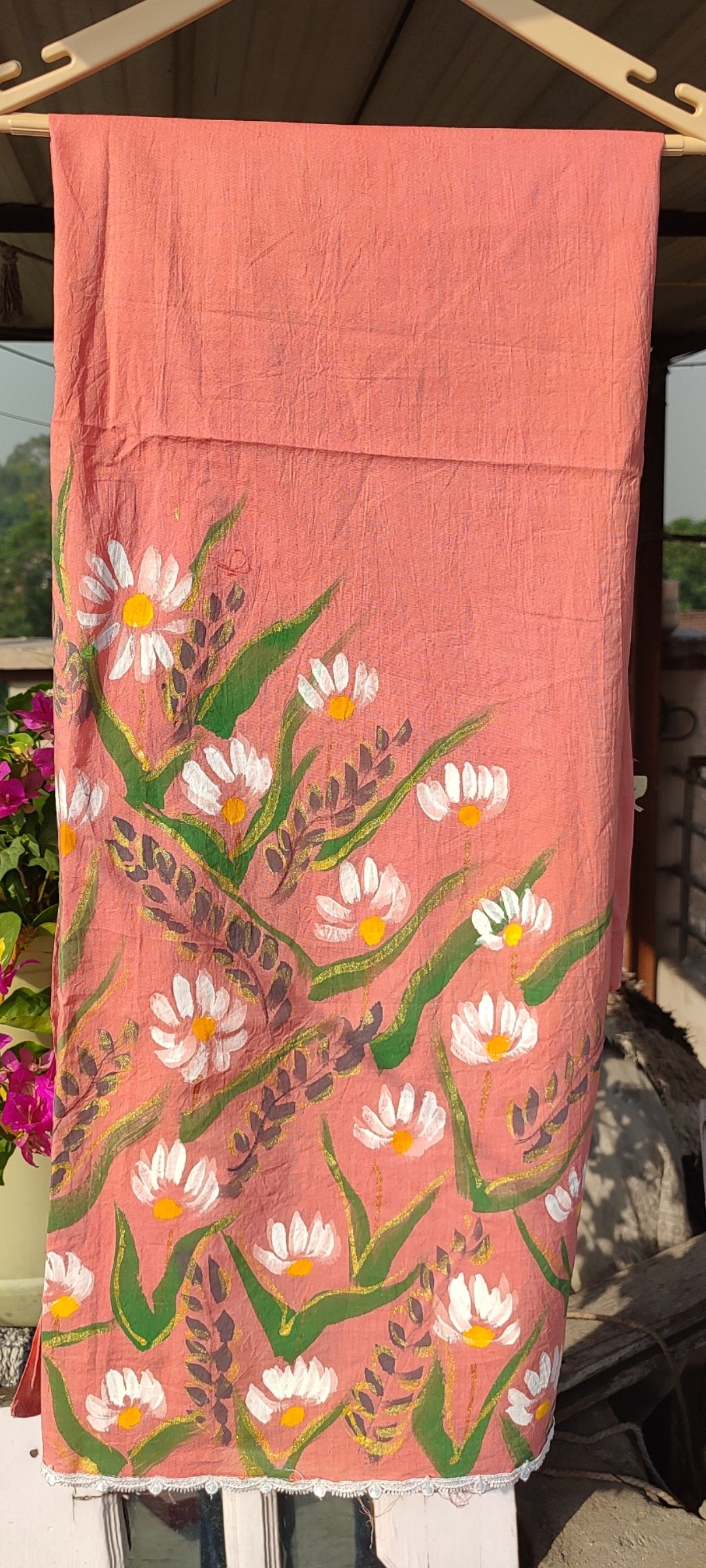 Hand-painted white flowers on peach cotton suit with kota doria dupatta