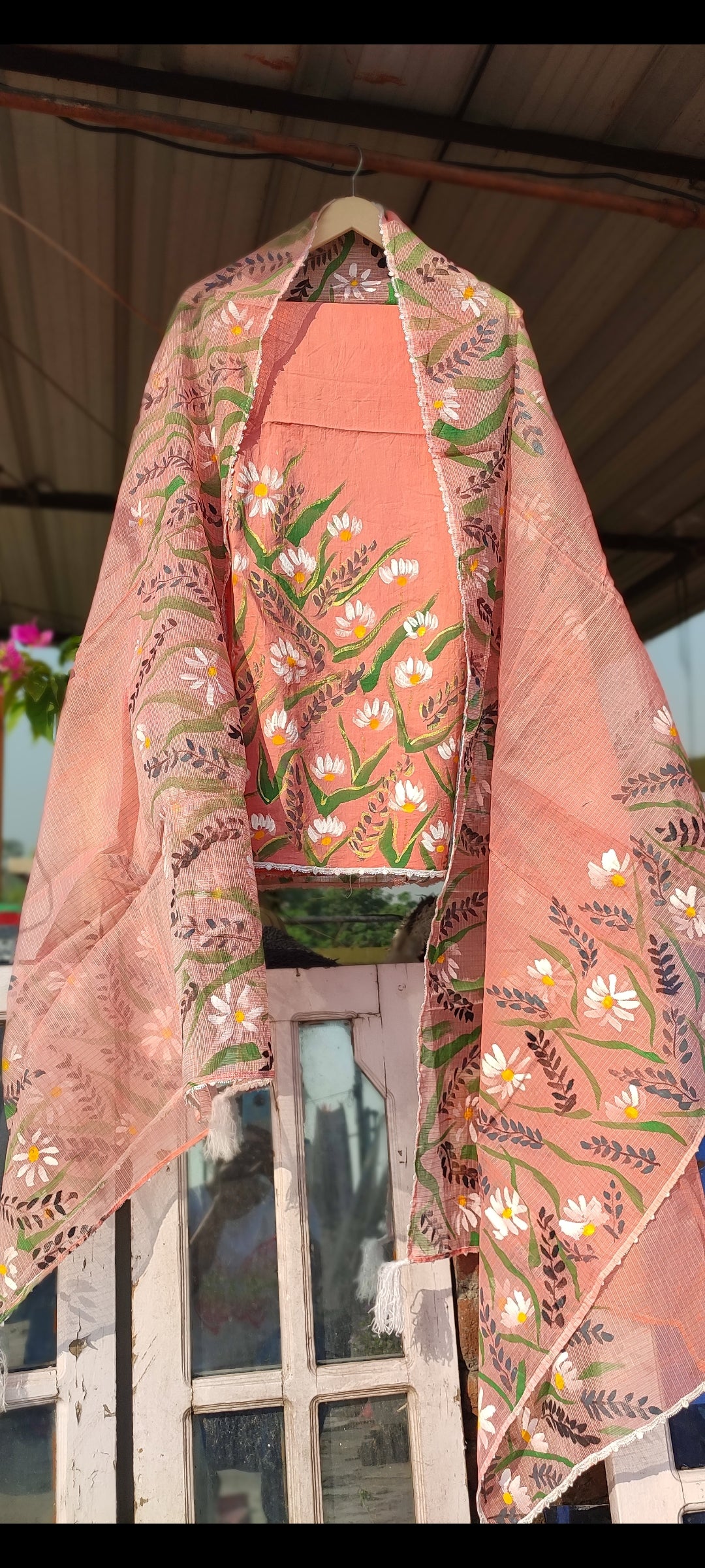 Hand-painted white flowers on peach cotton suit with kota doria dupatta