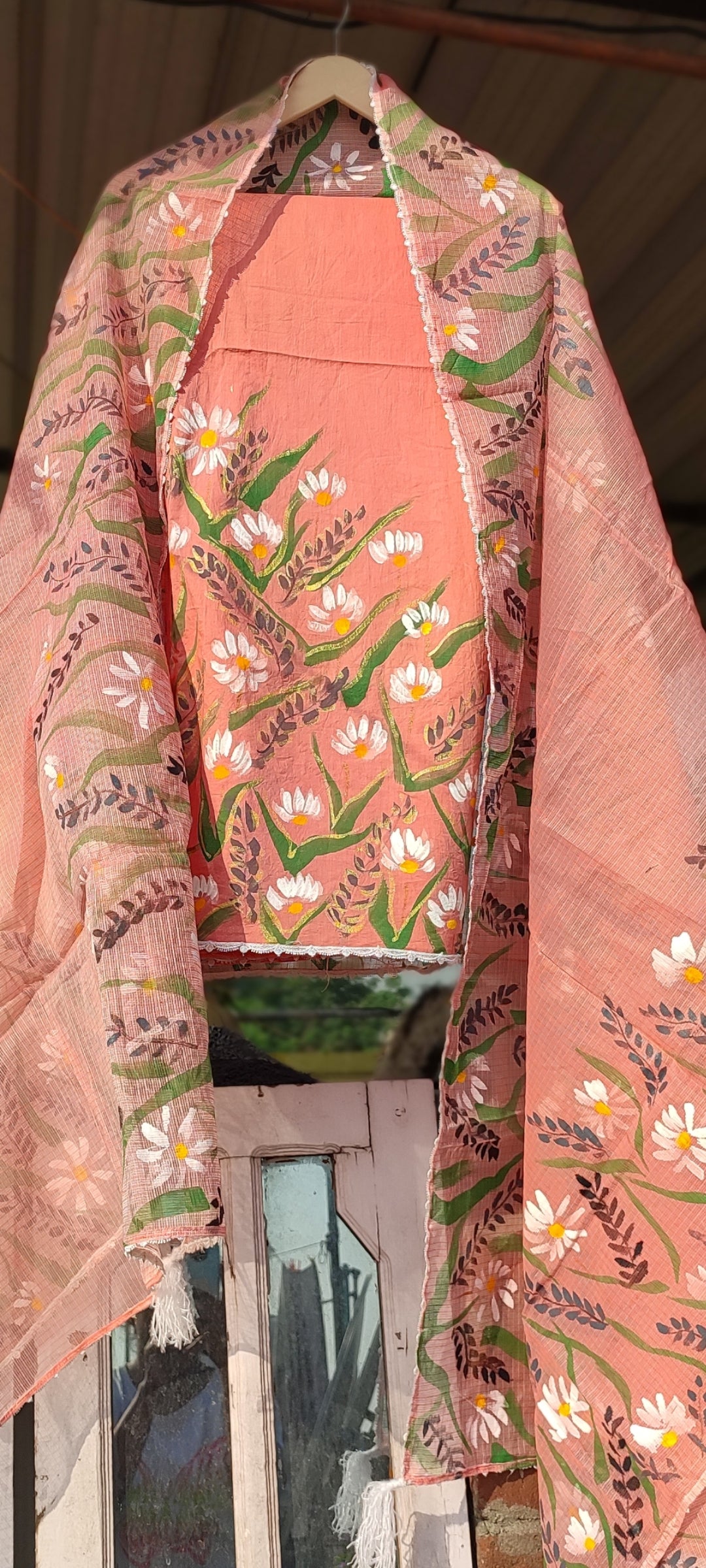 Hand-painted white flowers on peach cotton suit with kota doria dupatta