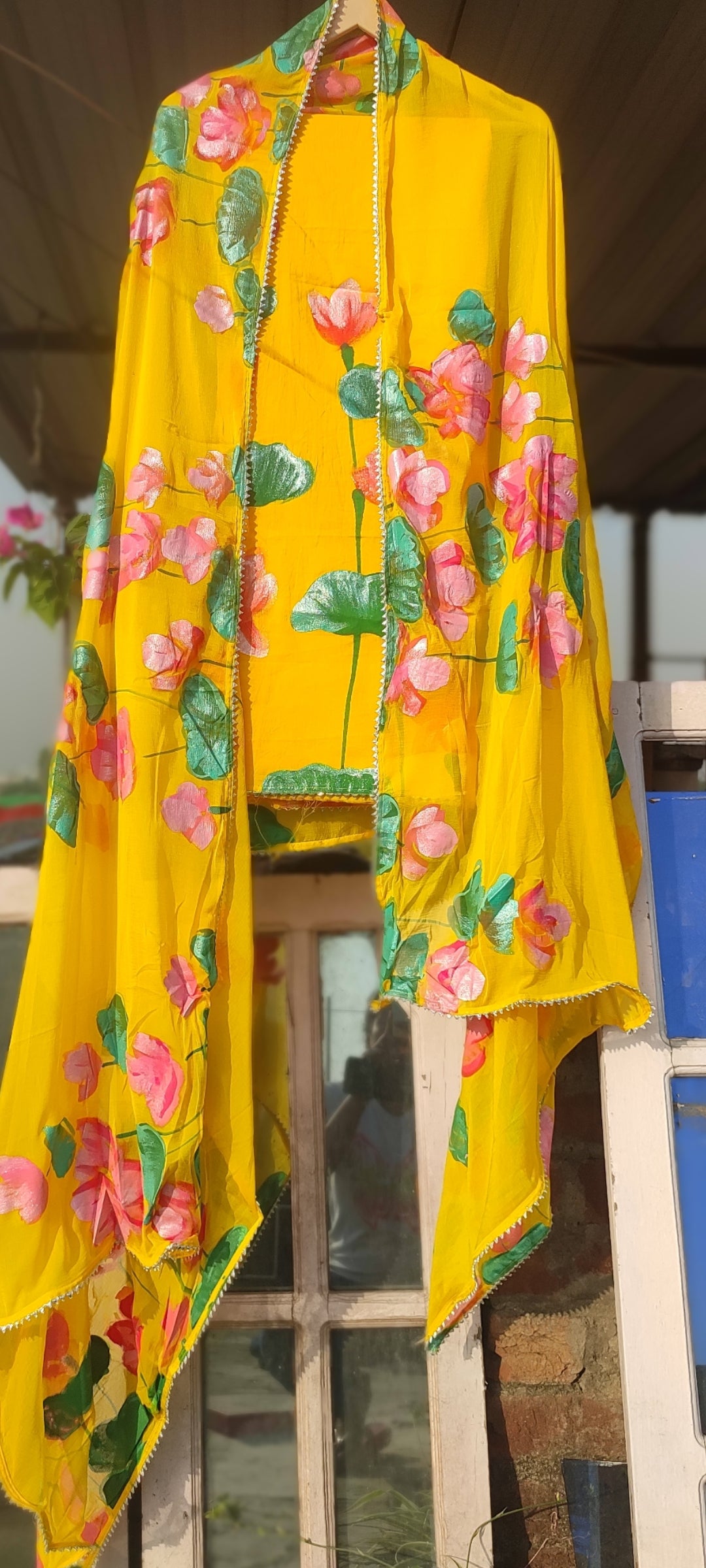Hand-painted lotus on yellow pure cotton suit with pure chiffon dupatta