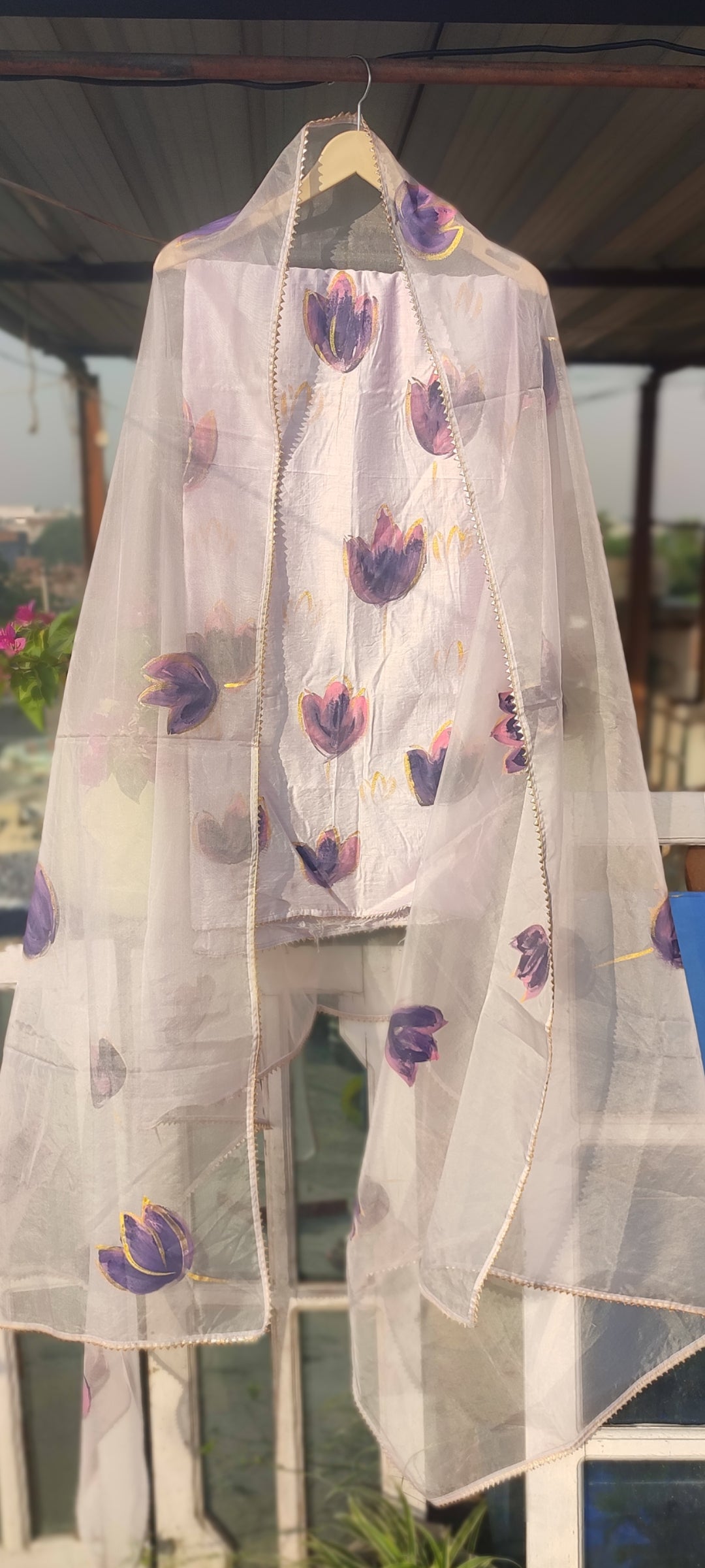 Hand painted purple chanderi silk suit with organza dupatta.