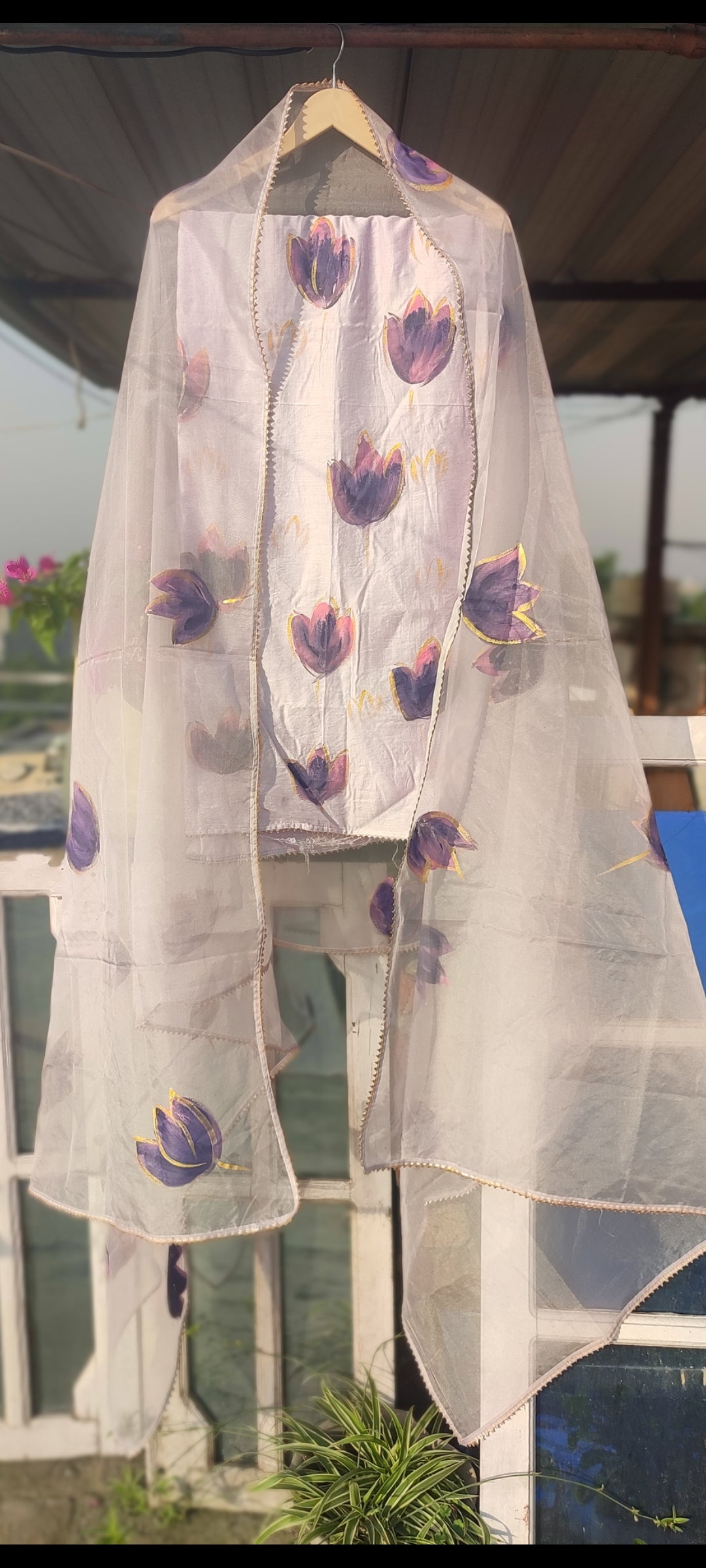 Hand painted purple chanderi silk suit with organza dupatta.