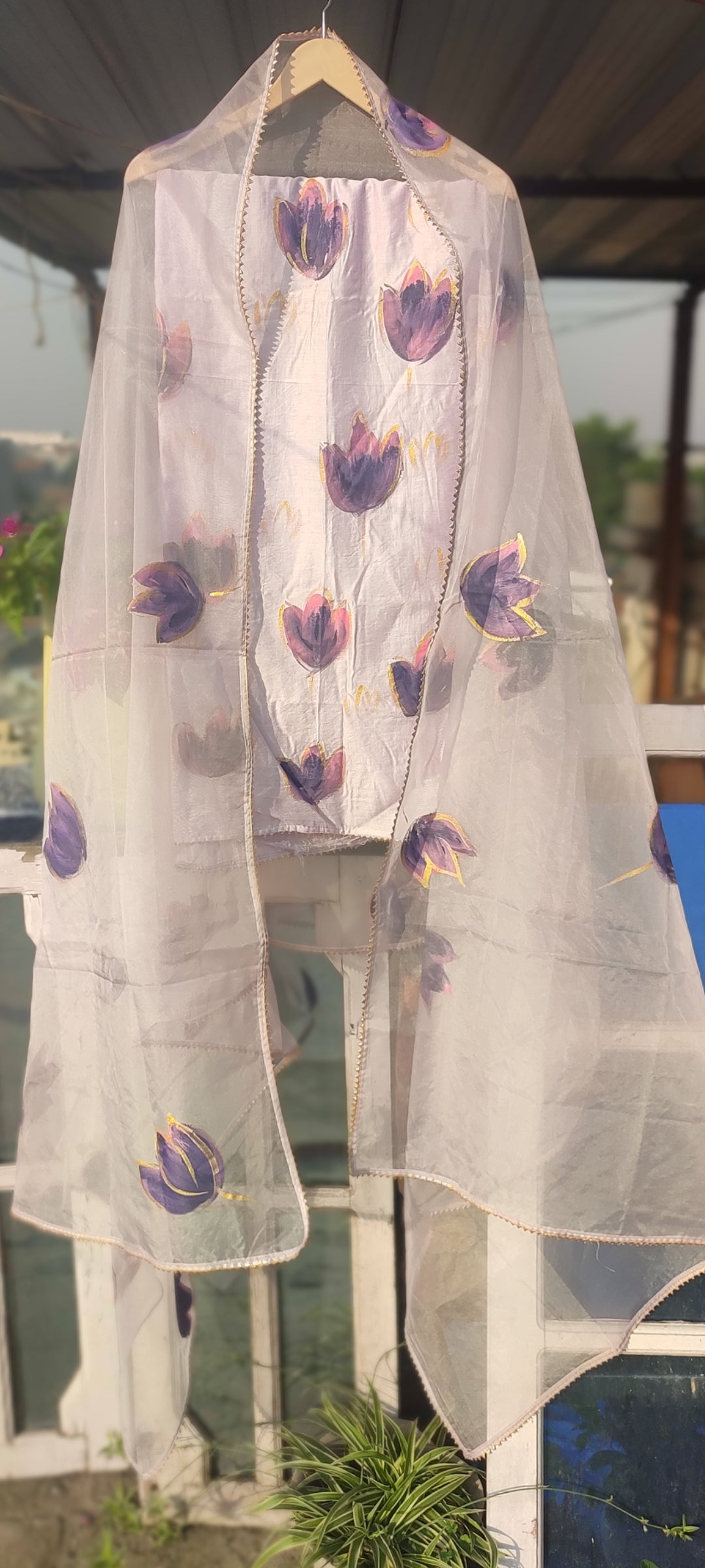 Hand painted purple chanderi silk suit with organza dupatta.