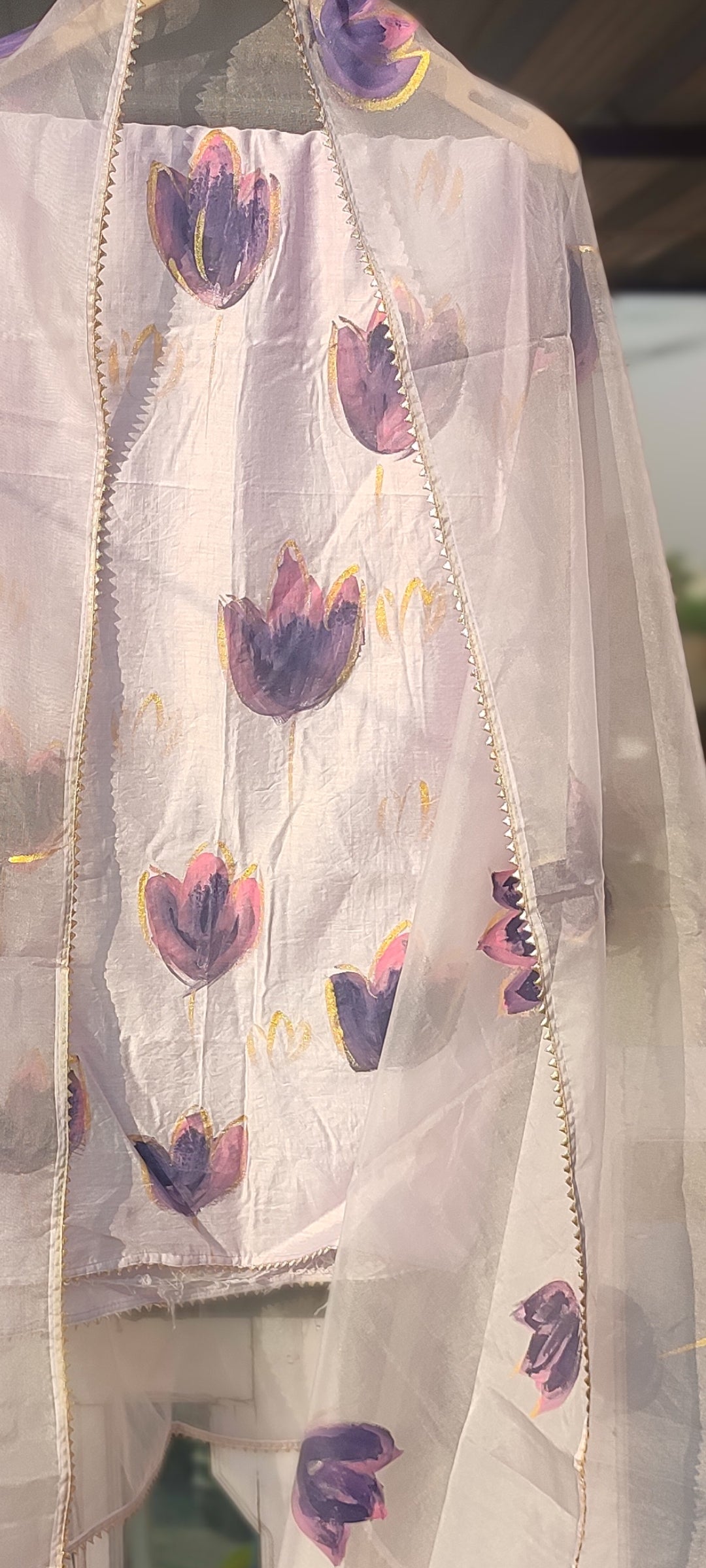 Hand painted purple chanderi silk suit with organza dupatta.