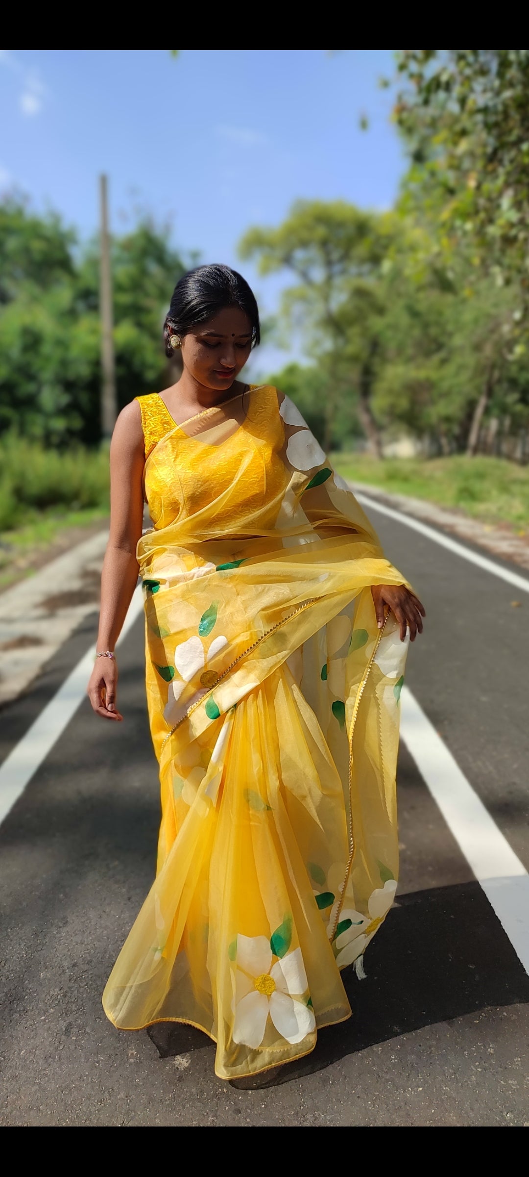 Yellow Handpainted organza  saree with white tassels