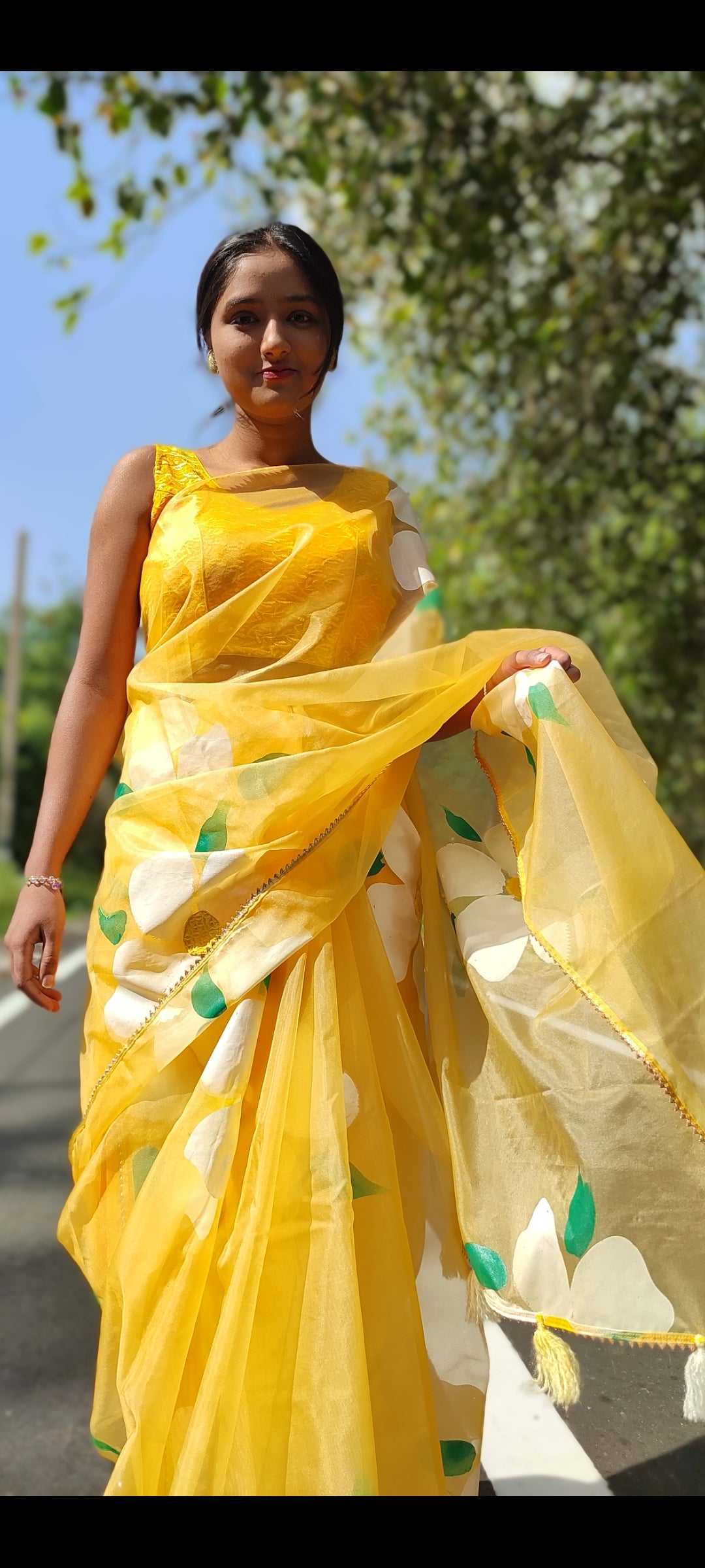 Yellow Handpainted organza  saree with white tassels