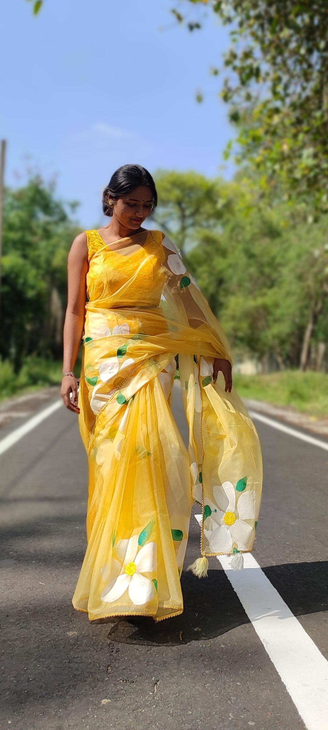 Yellow Handpainted organza  saree with white tassels