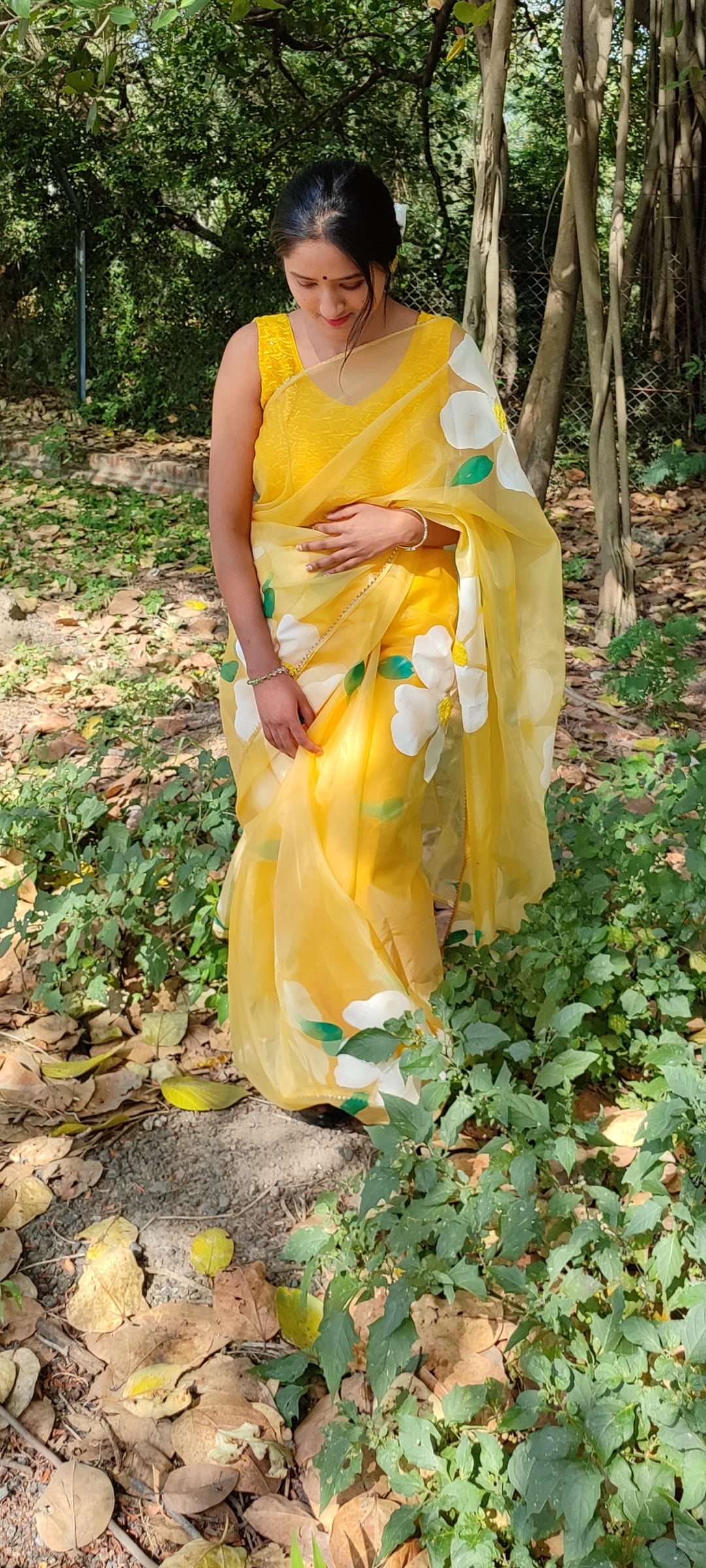 Yellow Handpainted organza  saree with white tassels