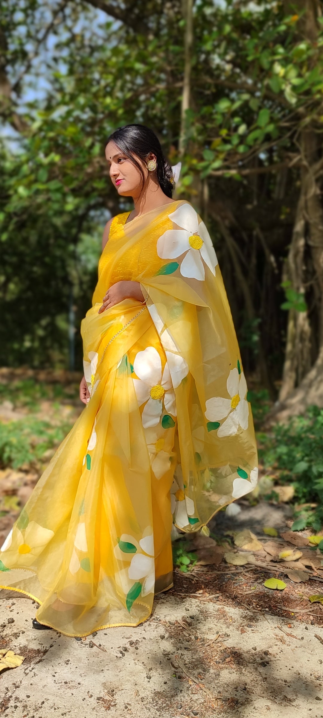 Yellow Handpainted organza  saree with white tassels