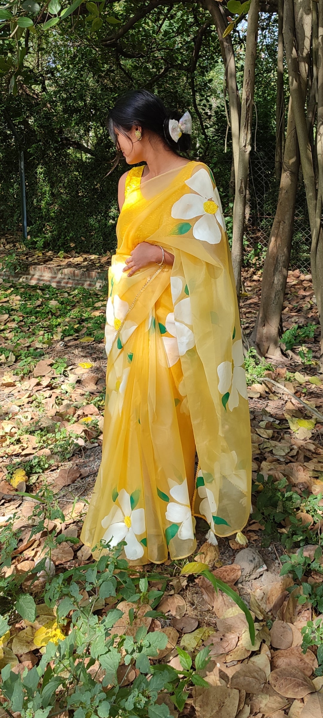 Yellow Handpainted organza  saree with white tassels