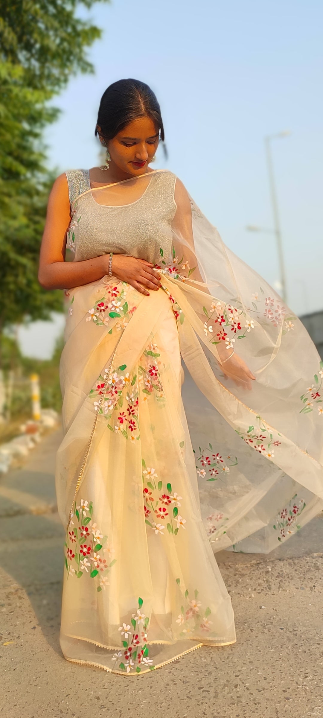 Beige Handpainted organza saree with tassels