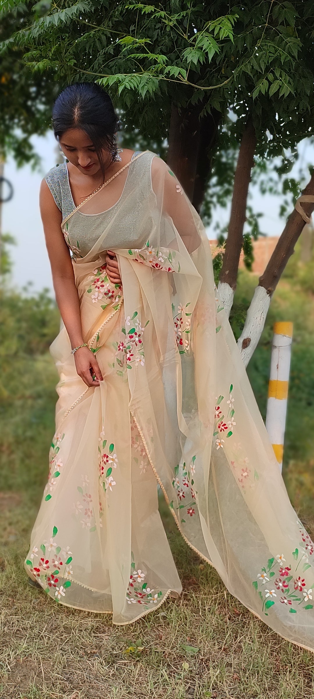 Beige Handpainted organza saree with tassels