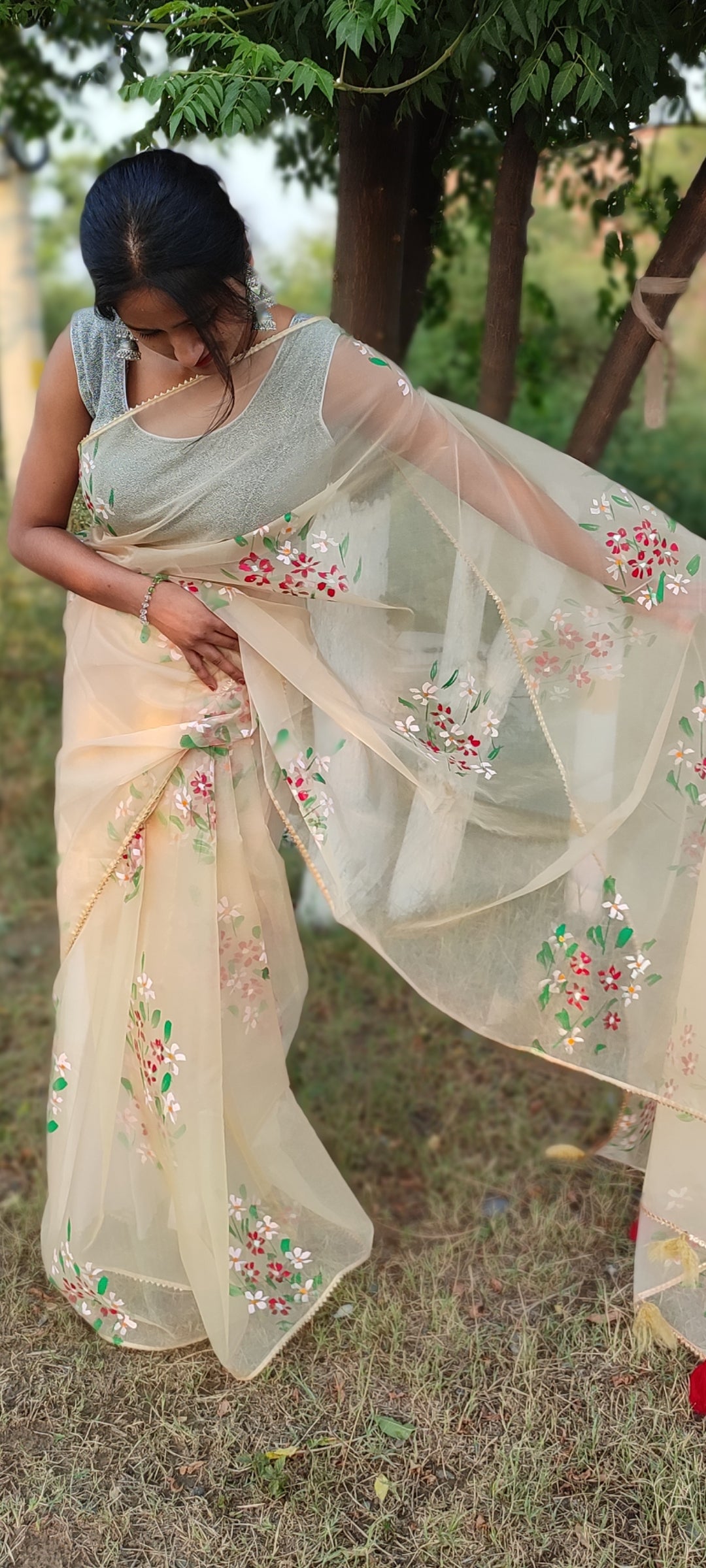 Beige Handpainted organza saree with tassels