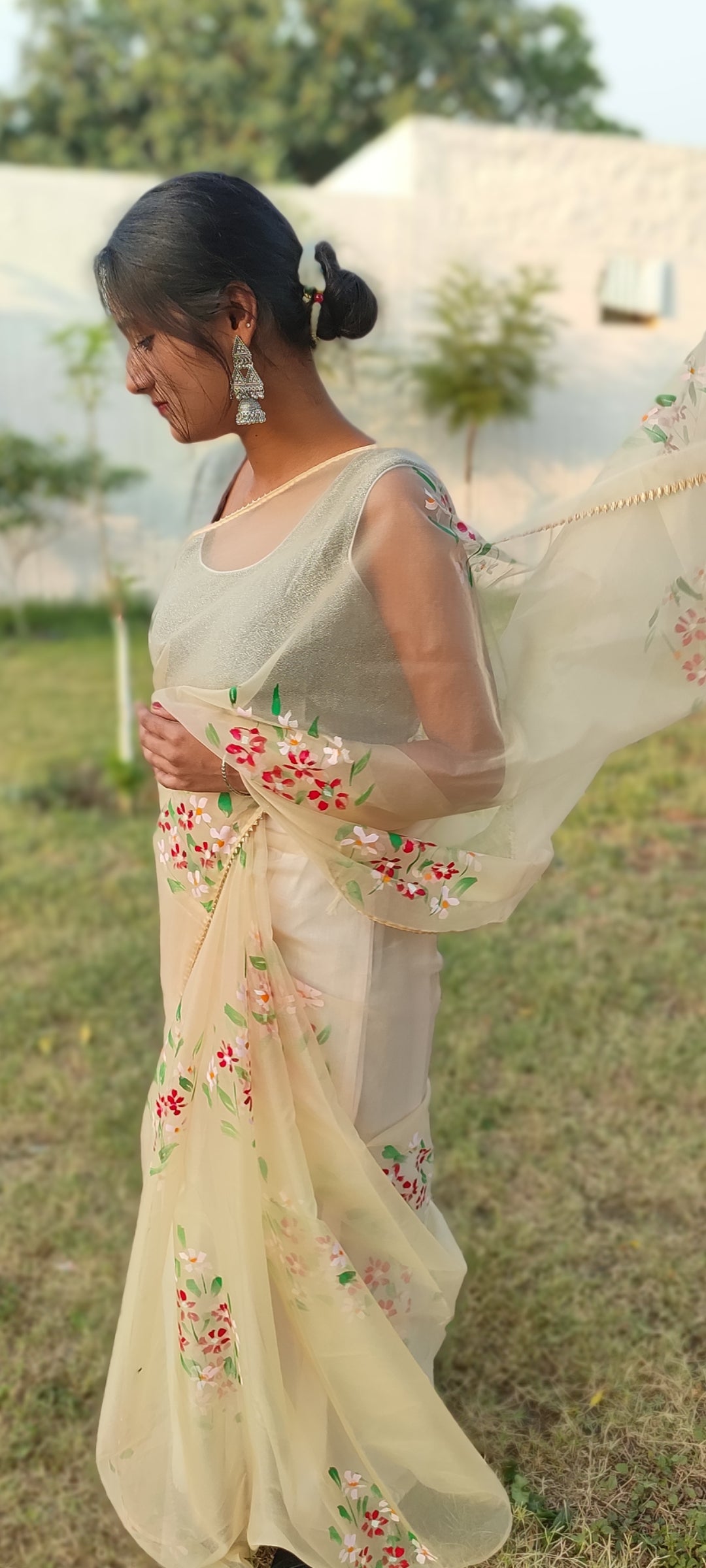 Beige Handpainted organza saree with tassels