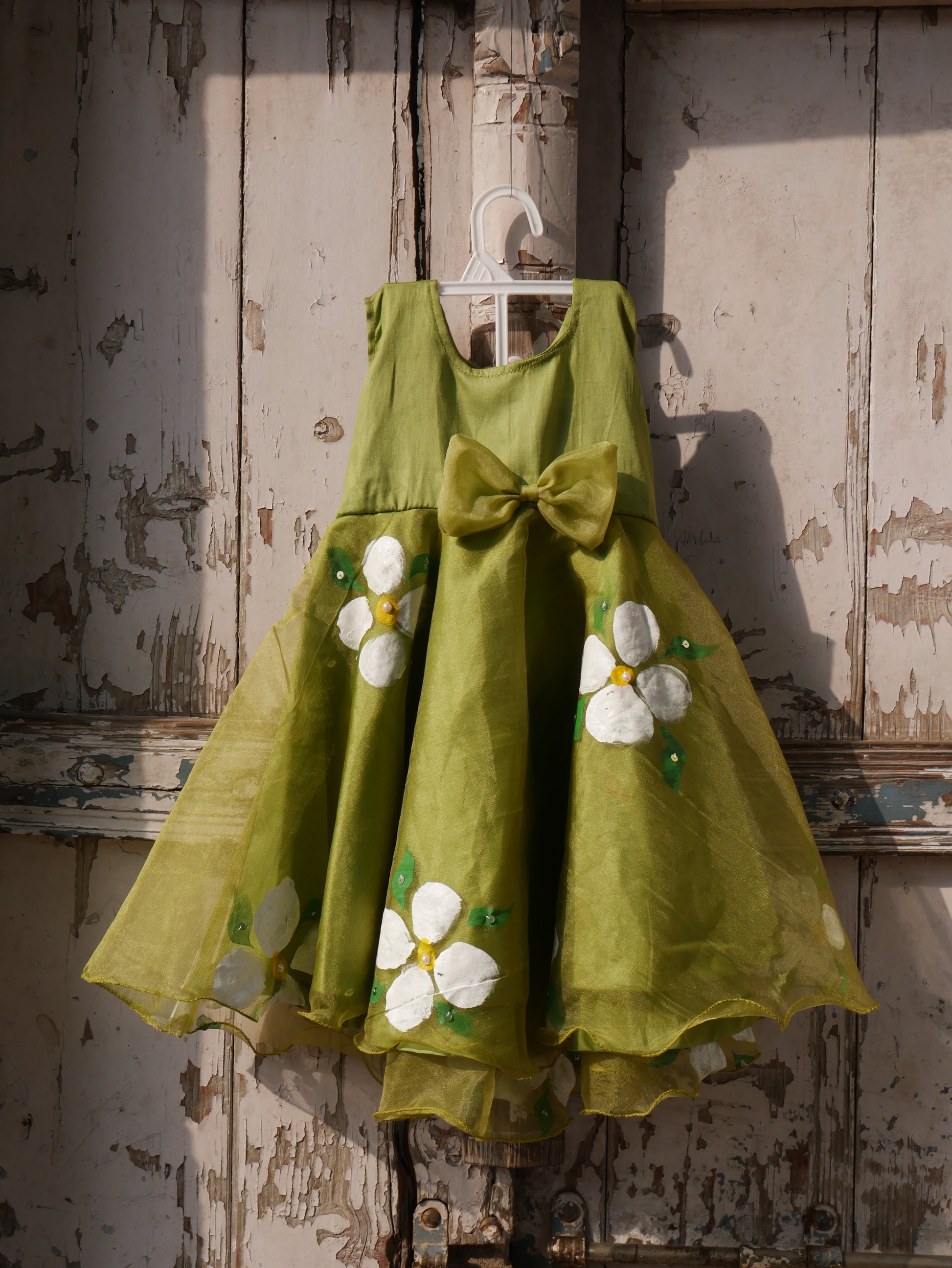 Mehndi green handpainted organza toddler frock Elegance By Aradhana Mehndi green handpainted organza toddler frock Elegance By Aradhana