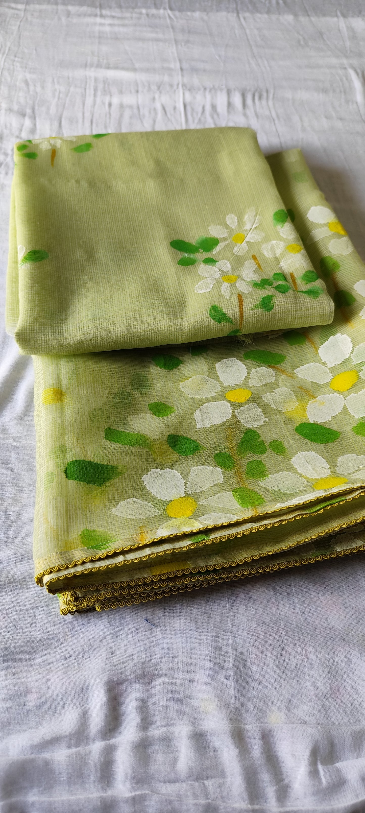 Pista green handpainted kota doria suit with white motifs
